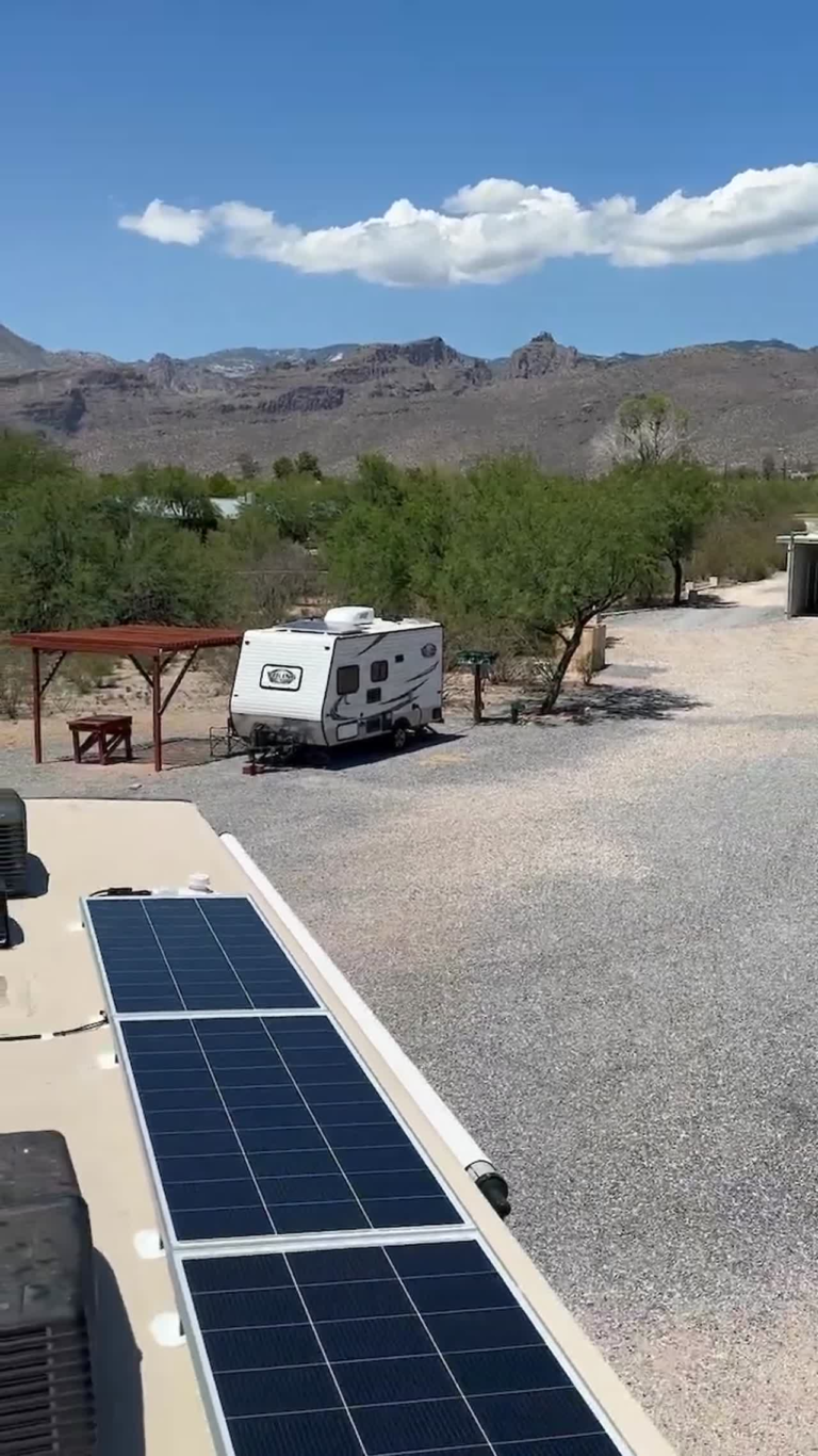 Rooftop RV solar panel array installed near Tucson with desert mountain views