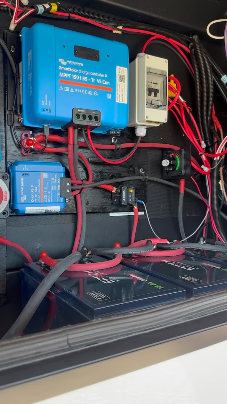 Existing RV solar equipment bay being evaluated before adding to a used system