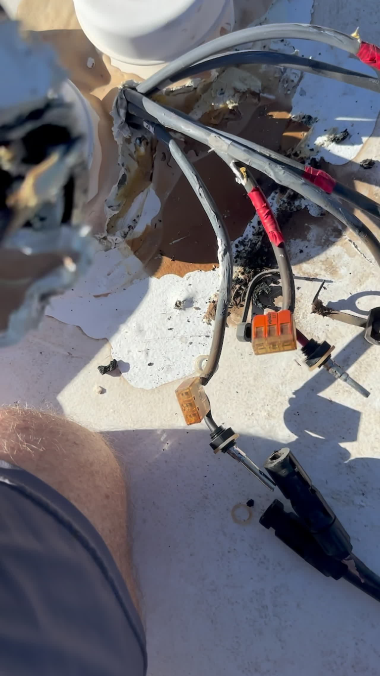 Melted RV wiring showing signs of a failing electrical system