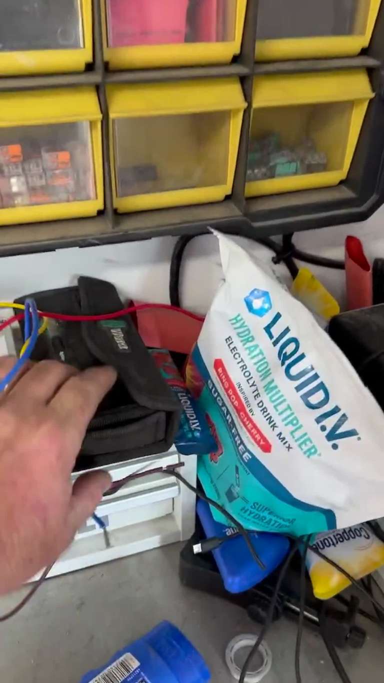 Installation tools and battery used during a professional RV solar install