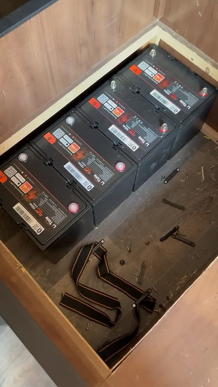 Four lithium batteries wired together as an RV battery bank