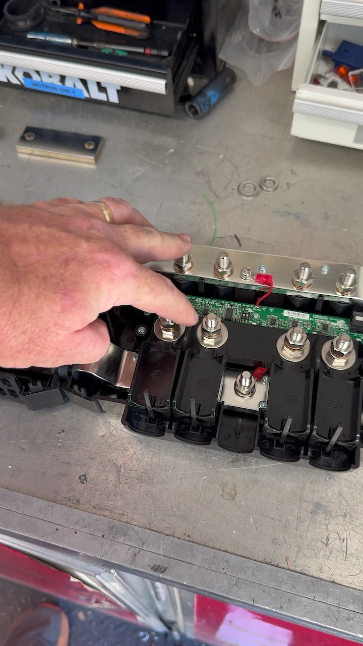 Victron Lynx Distributor assembly being wired on a workbench